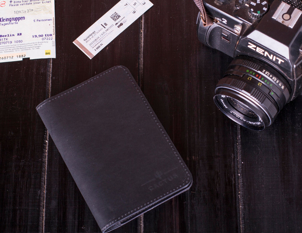 Porta pasaporte Negro